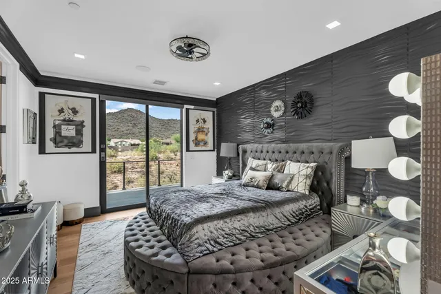 a bath room with a toilet a sink and a mirror