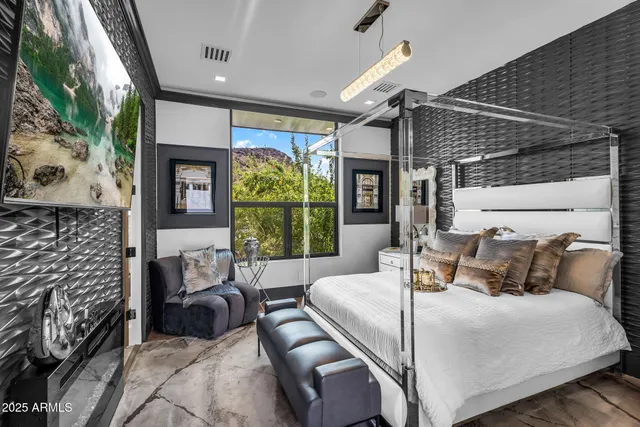 a spacious bathroom with a sink double vanity and a mirror