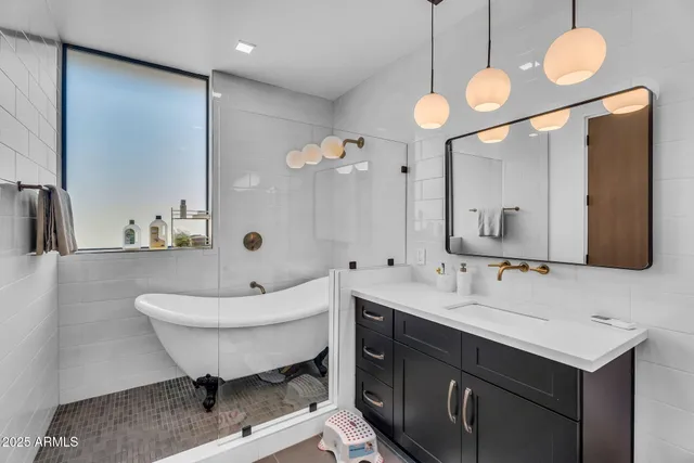 a view of balcony with two couches and wooden floor