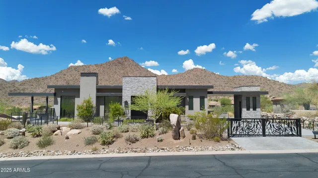 a front view of a house with yard