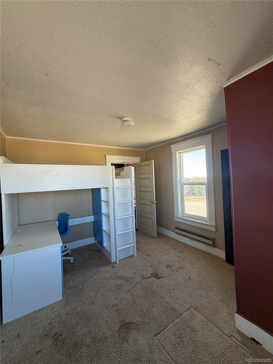 28894 Highway 24 Stratton, CO 80836 - Photo 22 of 41 a view of livingroom with furniture and window