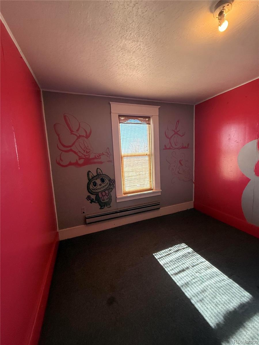 28894 Highway 24 Stratton, CO 80836 - Photo 24 of 41 a view of an empty room with a window