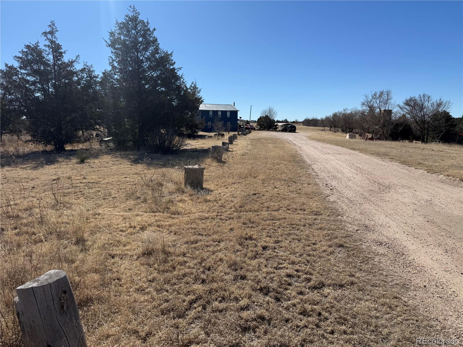 28894 Highway 24 Stratton, CO 80836 - Photo 28 of 41 a view of a yard with an outdoor space