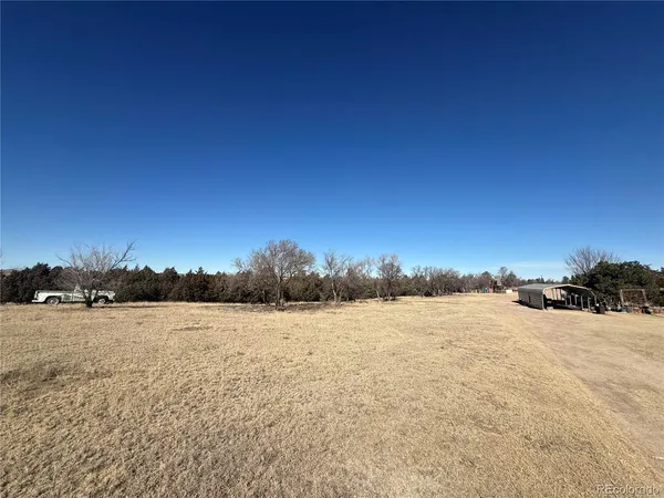 a view of a backyard of a house
