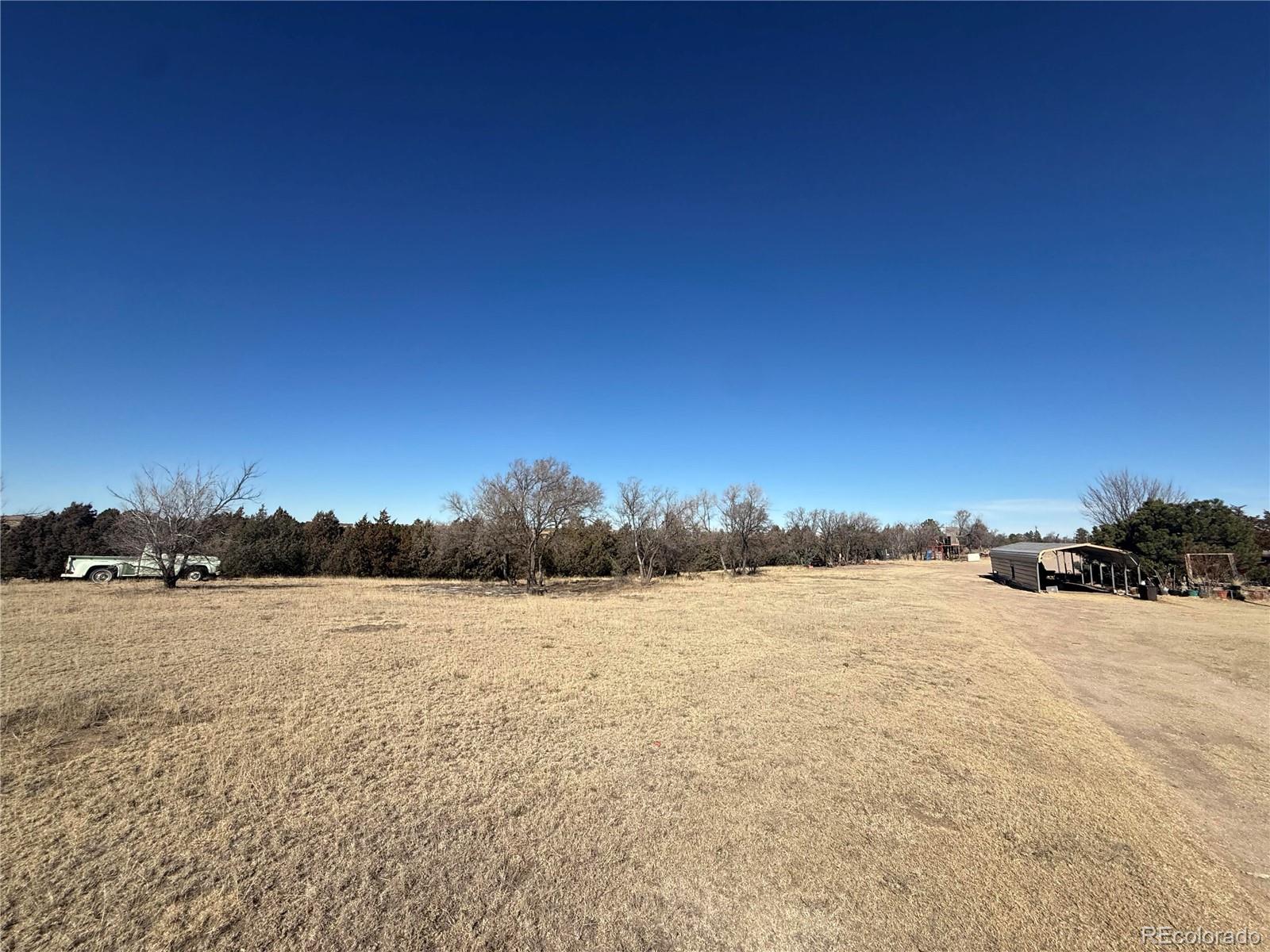 28894 Highway 24 Stratton, CO 80836 - Photo 32 of 41 a view of patio and a yard