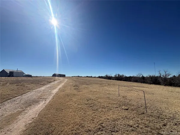 a view of wooden floor and a ocean view