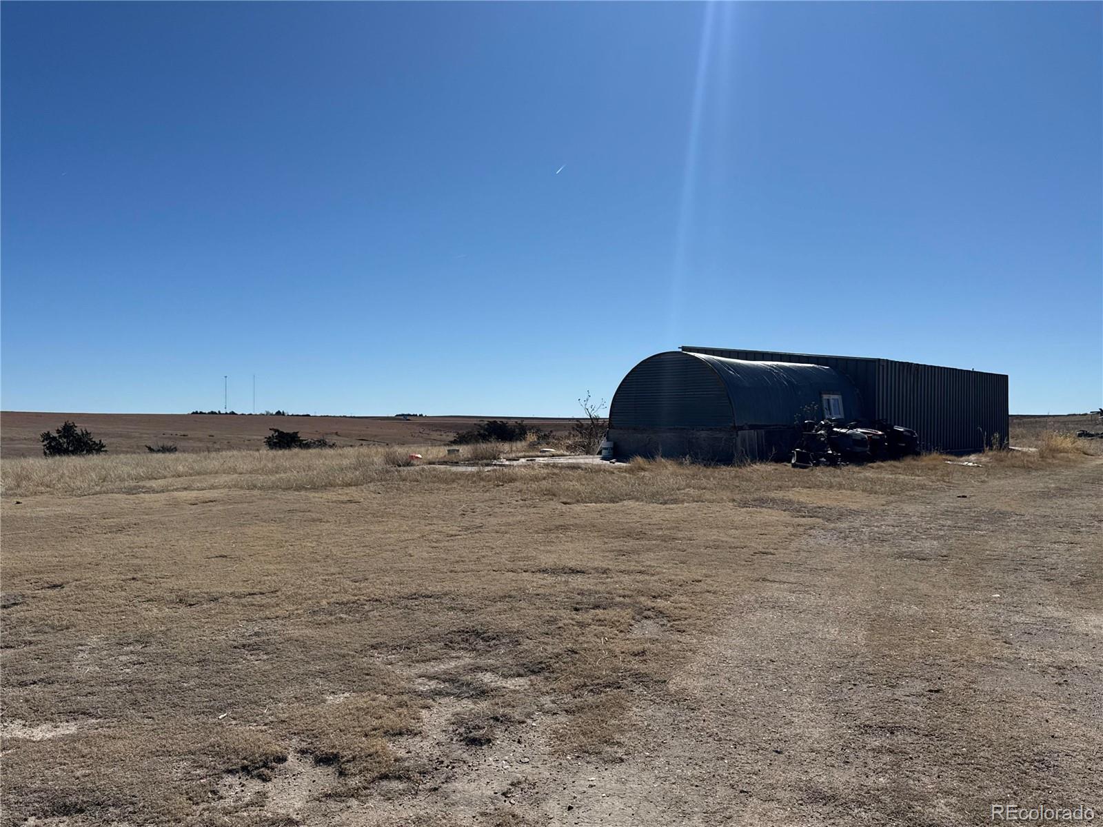 28894 Highway 24 Stratton, CO 80836 - Photo 35 of 41 a view of wooden floor and a ocean view