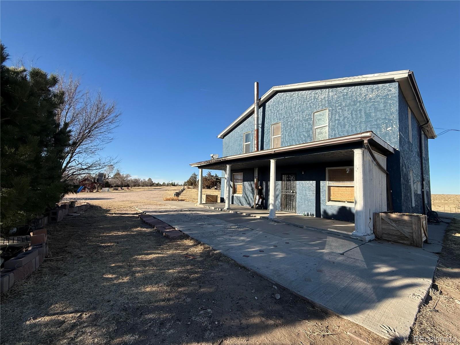28894 Highway 24 Stratton, CO 80836 - Photo 4 of 41 a view of a house with backyard