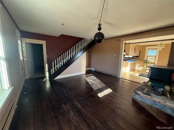 a view of entryway with wooden floor
