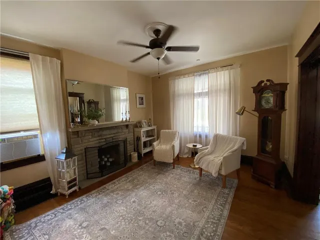 a living room with furniture and a window