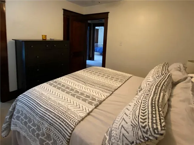 a bathroom with a toilet and a bathtub