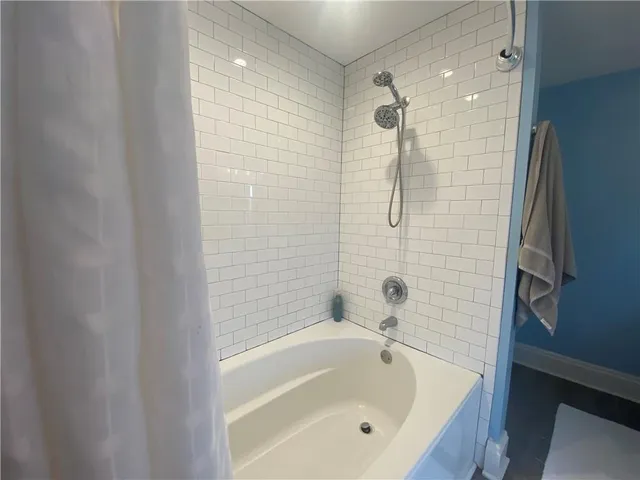a bathroom with a sink and mirror