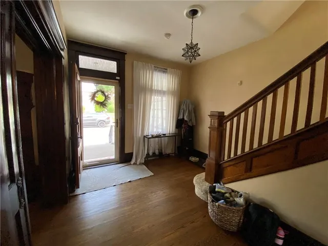 a view of an entryway with a workspace