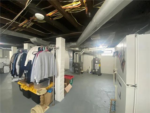 a close view of a toilet and a sink in a bathroom