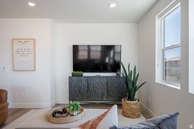 762 West Periwinkle Lane, Unit 102 St. George, UT 84790 - Photo 8 of 40 Living room featuring wood finished floors and recessed lighting