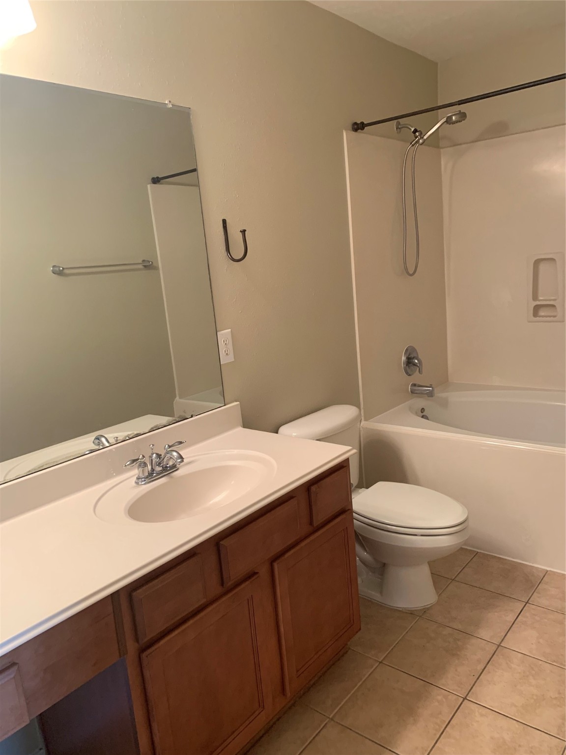 8823 Old Maple Lane Humble, TX 77338 - Photo 11 of 13 a bathroom with a sink toilet vanity and shower