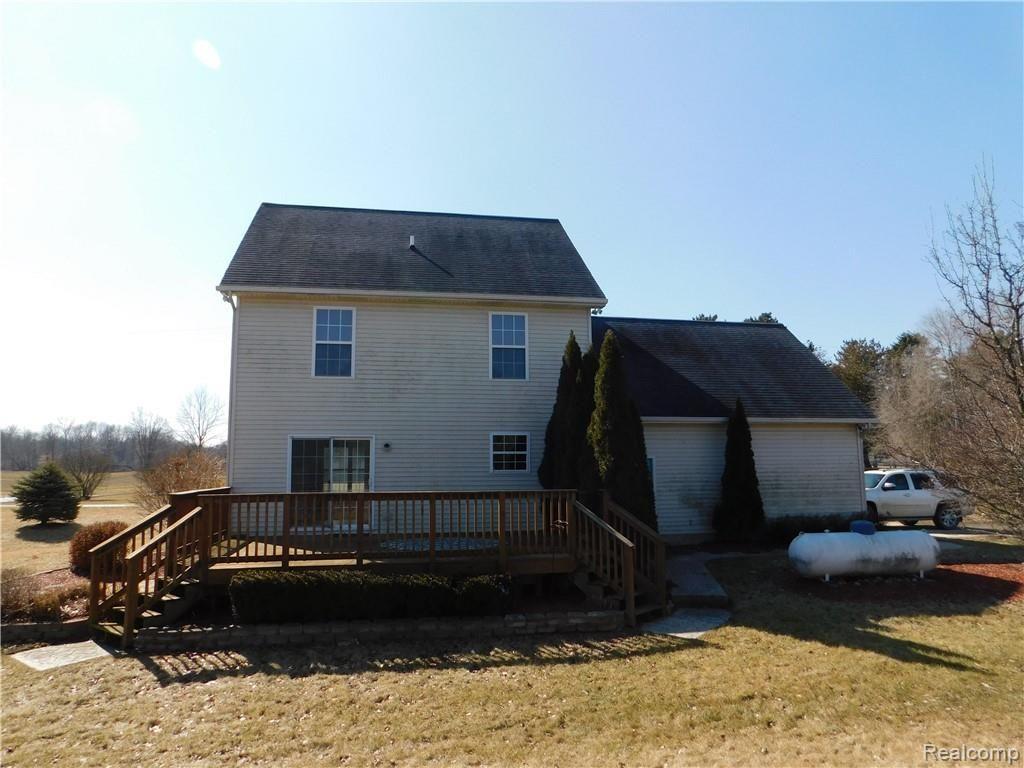2176 Fowlerville Road Fowlerville, MI 48836 - Photo 11 of 11 2176 fowlerville back.JPG