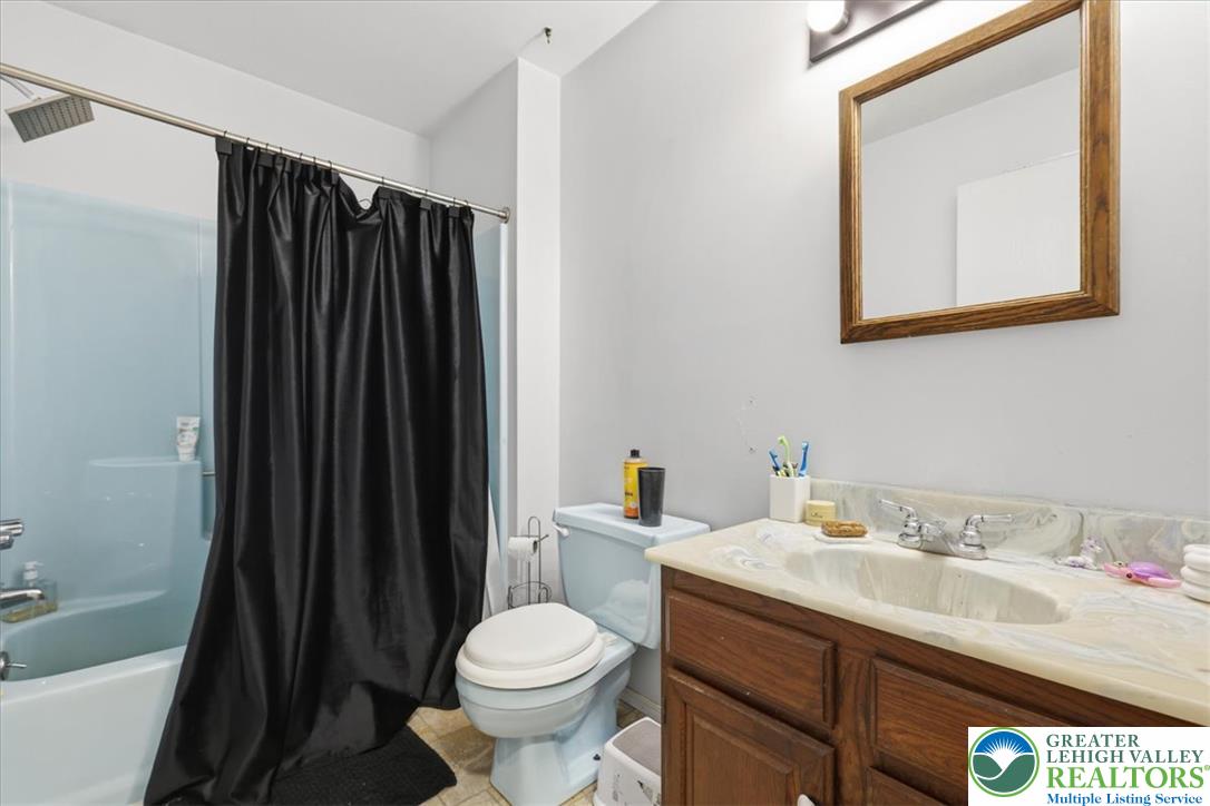 520 Highland Hill Road Jim Thorpe, PA 18235 - Photo 35 of 83 A well-appointed bathroom features a practical vanity and convenient shower over tub.