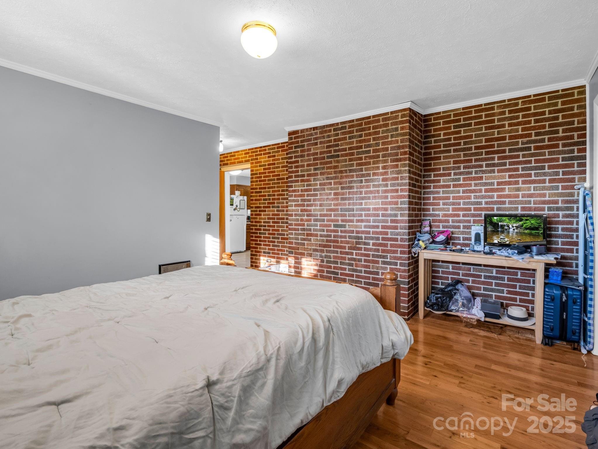 290 Stepp Mill Road Hendersonville, NC 28792 - Photo 15 of 29 a bedroom with a bed and a dresser