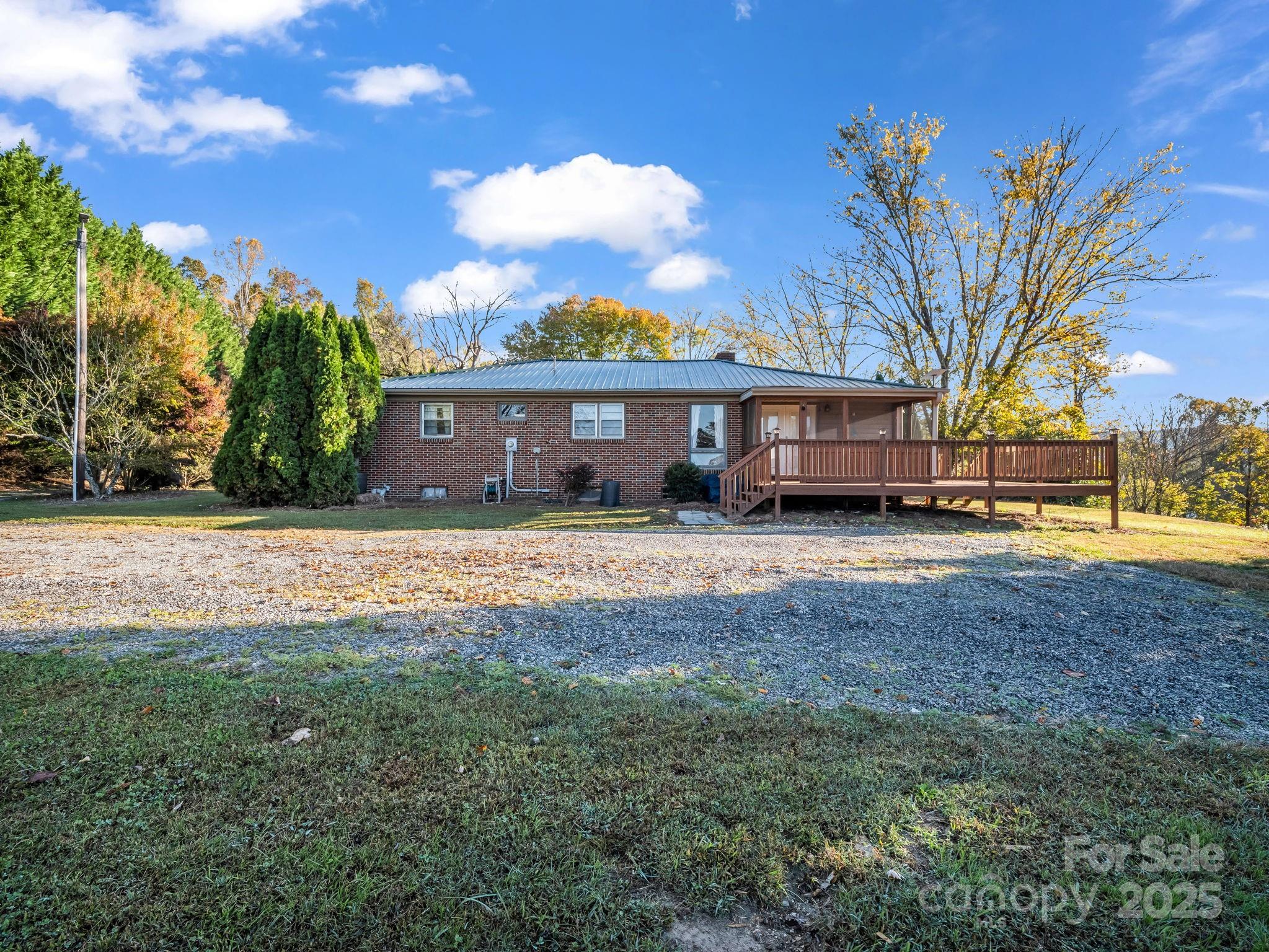 290 Stepp Mill Road Hendersonville, NC 28792 - Photo 26 of 29 a view of house with a yard