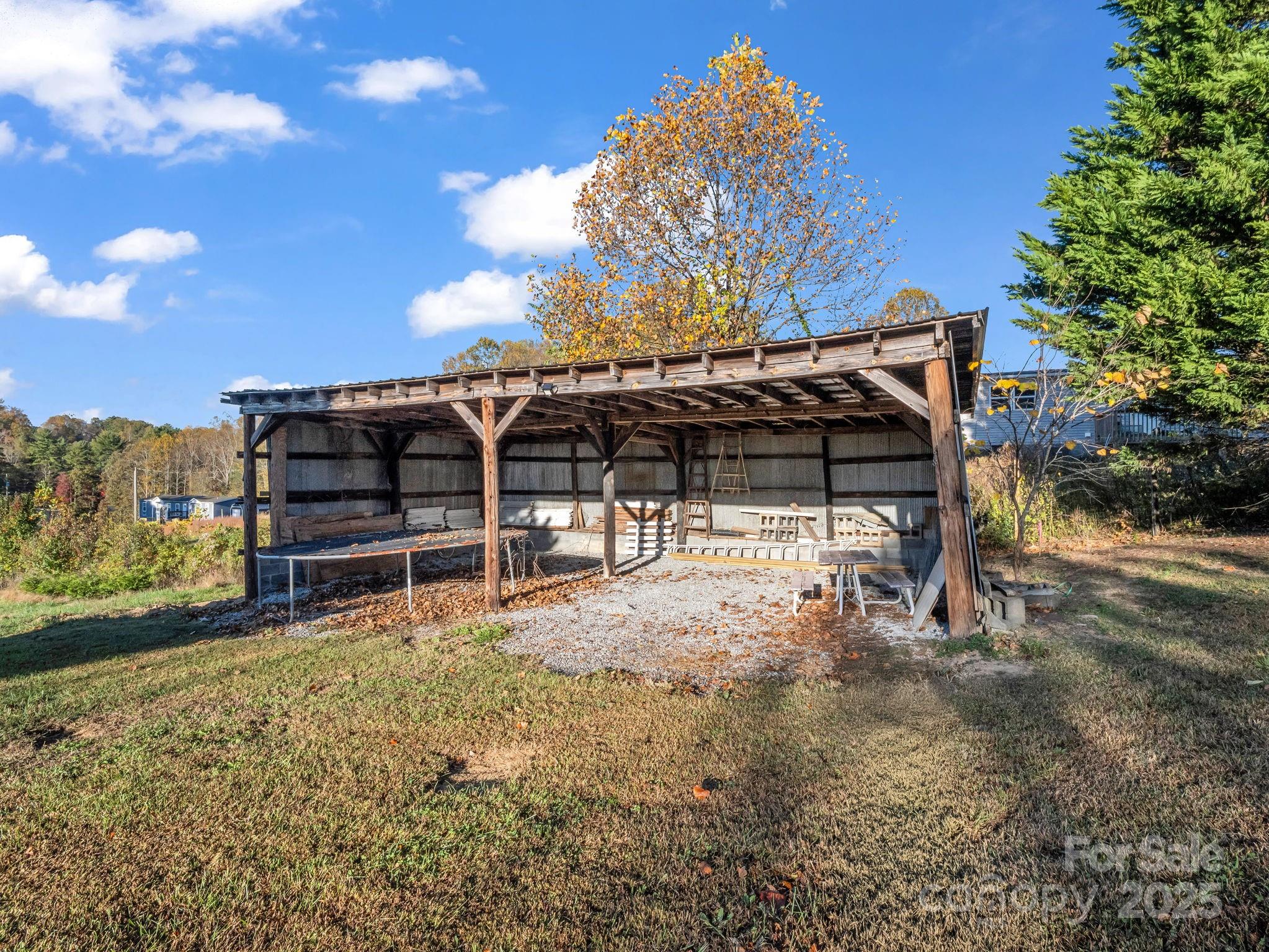290 Stepp Mill Road Hendersonville, NC 28792 - Photo 27 of 29 a view of a house with a yard