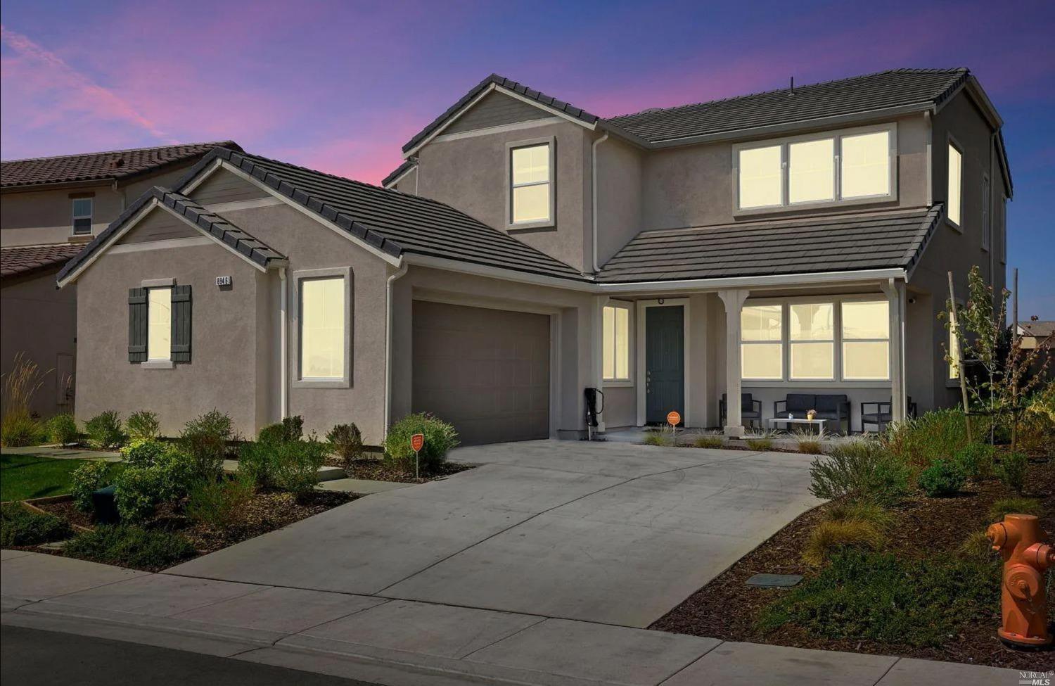 8846 Blue River Drive Vallejo, CA 94591 - Photo 1 of 1 a front view of a house with lots of trees and plants