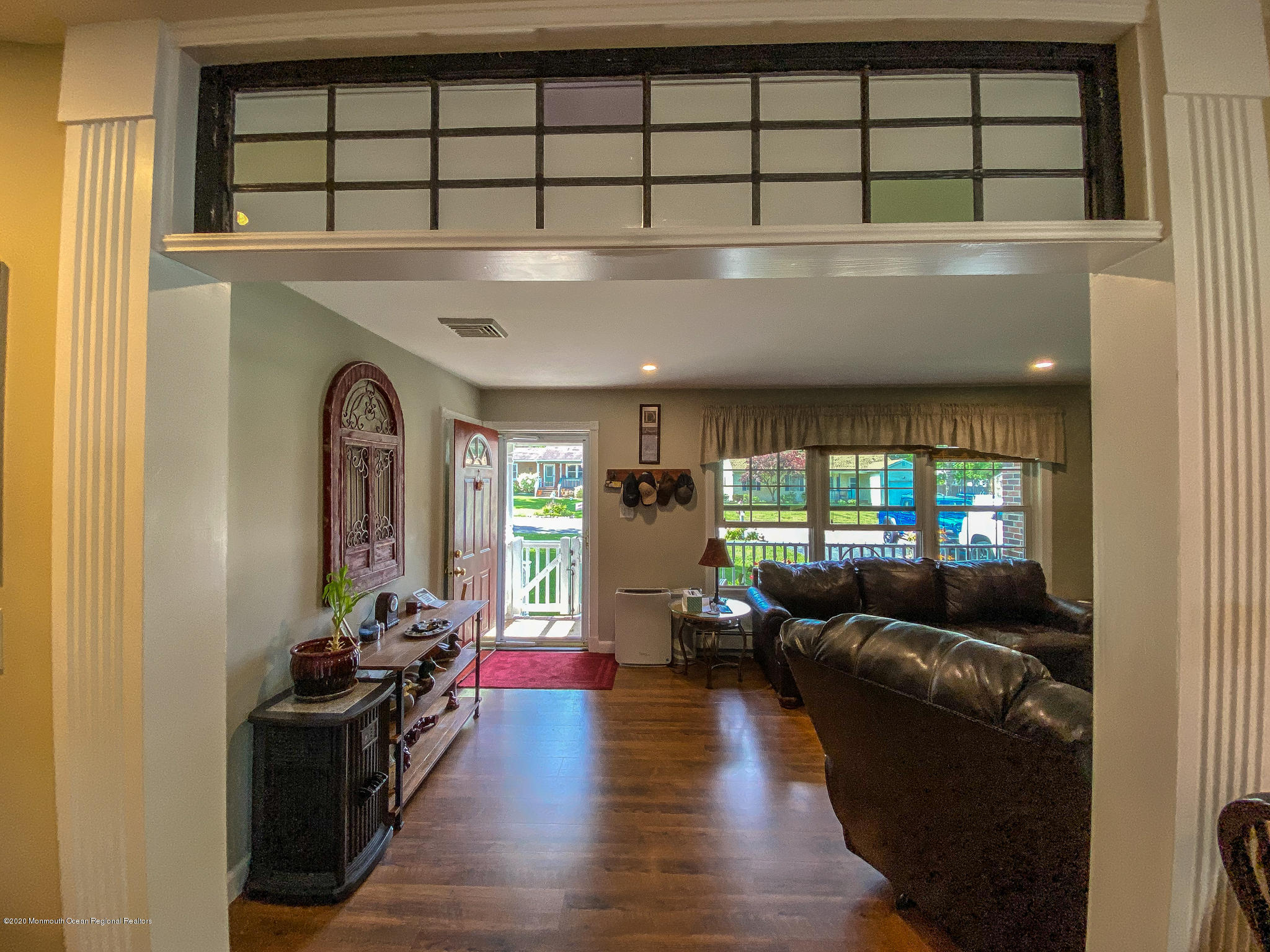 220 Wave Road Manahawkin, NJ 08050 - Photo 57 of 87 a living room with furniture and a large window