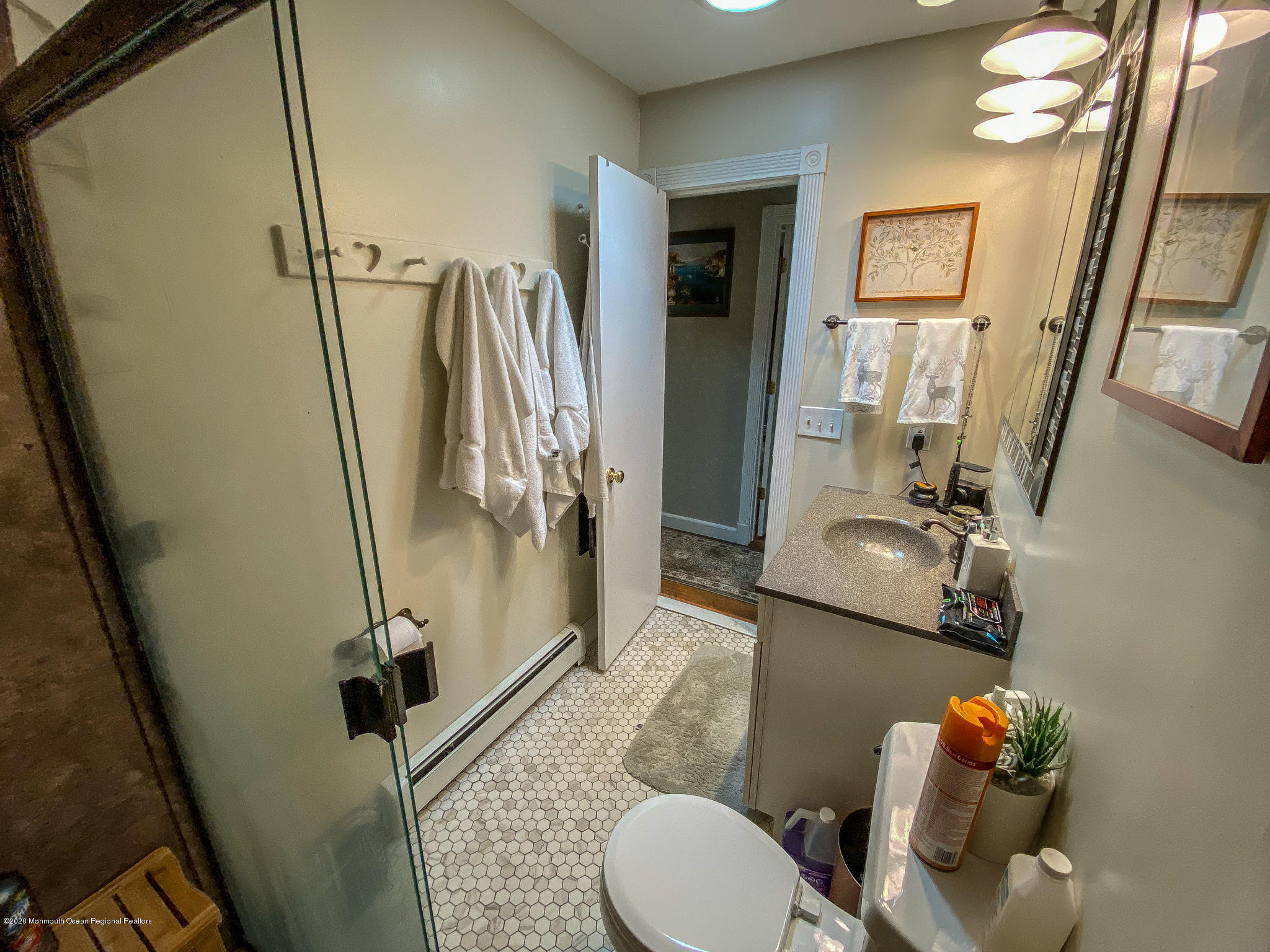 220 Wave Road Manahawkin, NJ 08050 - Photo 64 of 87 a bathroom with a sink toilet and shower