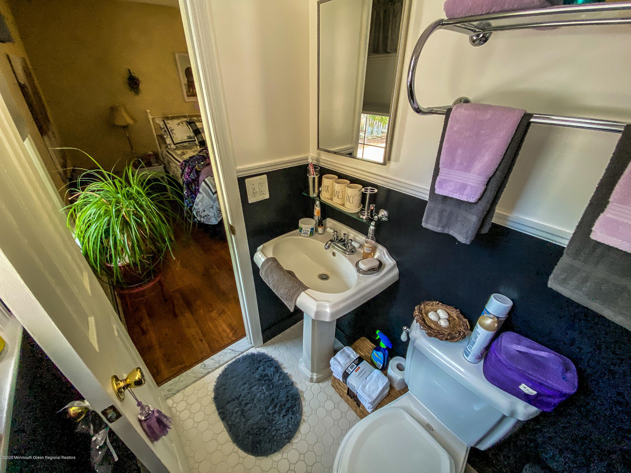 220 Wave Road Manahawkin, NJ 08050 - Photo 75 of 87 a bathroom with a sink mirror and vanity