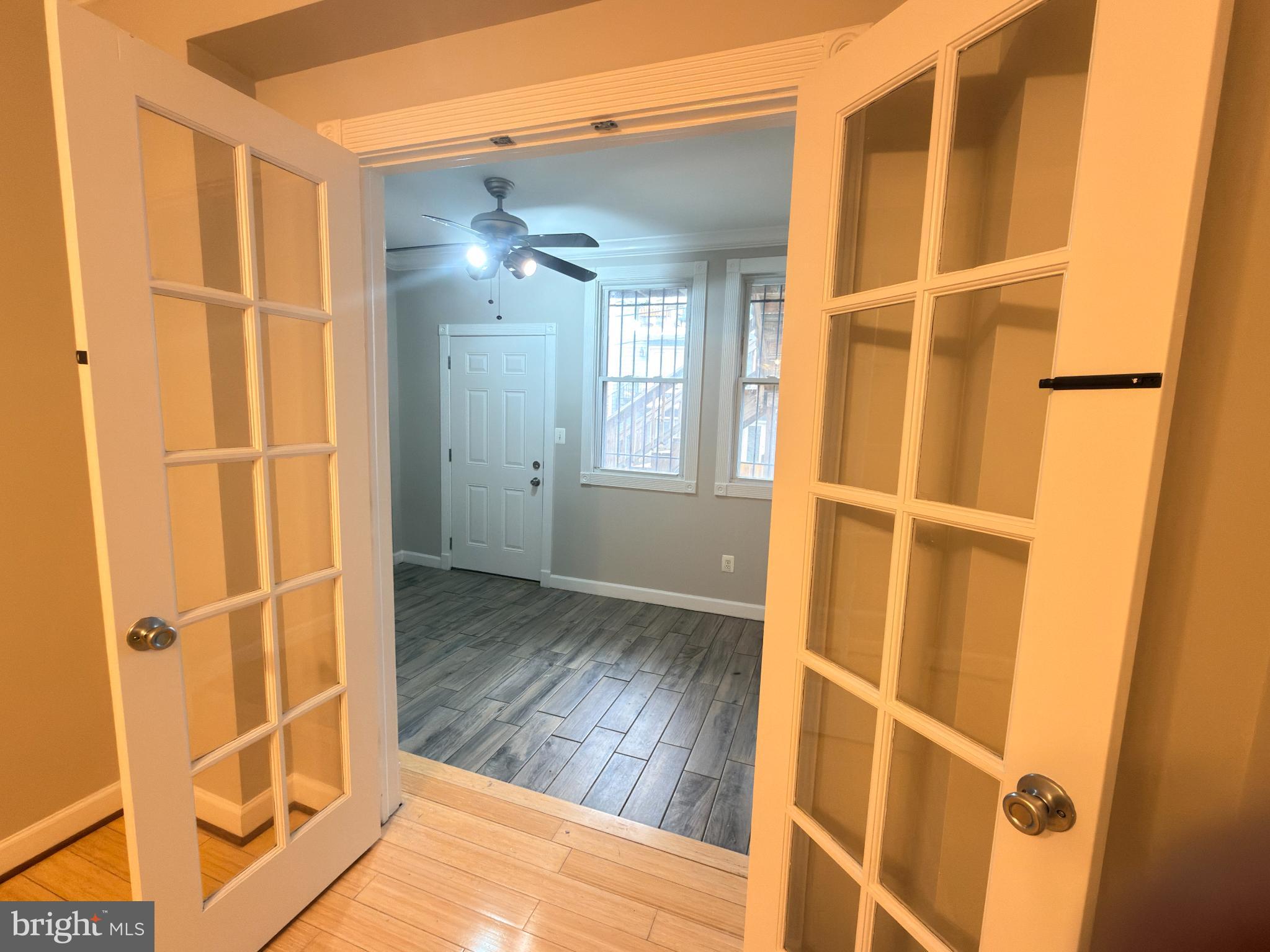 1246 Queen Street Northeast, Unit 2 Washington, DC 20002 - Photo 17 of 23 Charming entryway with elegant French doors.
