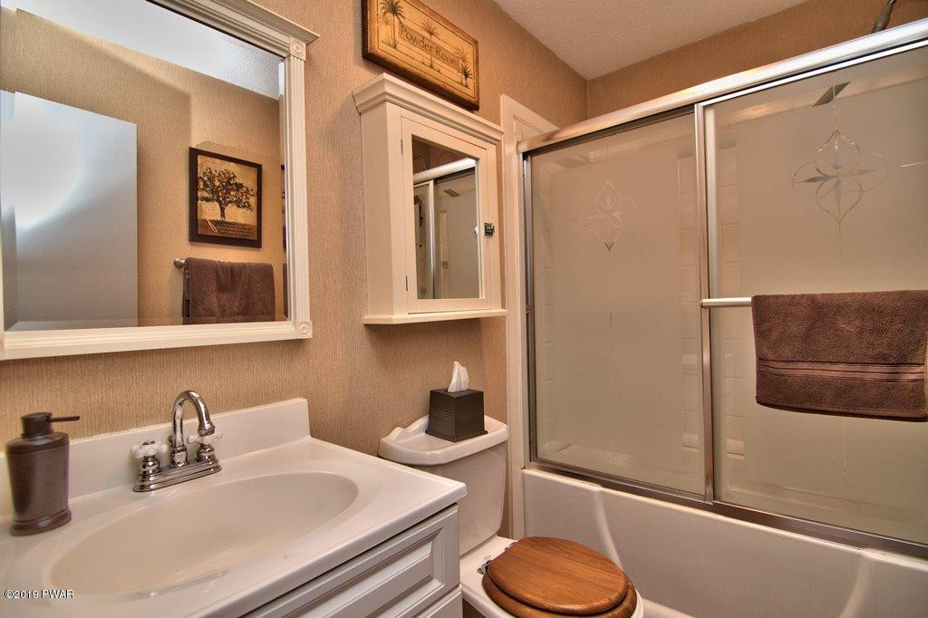 3151 Northgate Road Lake Ariel, PA 18436 - Photo 22 of 68 a bathroom with a sink toilet and shower