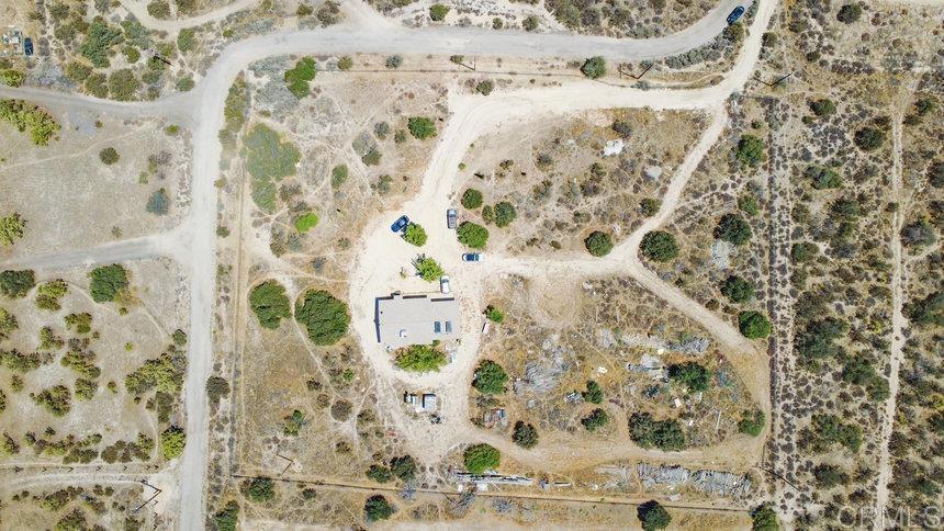 39635 Manzanita Dulce Road Boulevard, CA 91905 - Photo 19 of 33 a bathroom with a bathtub and shower curtain