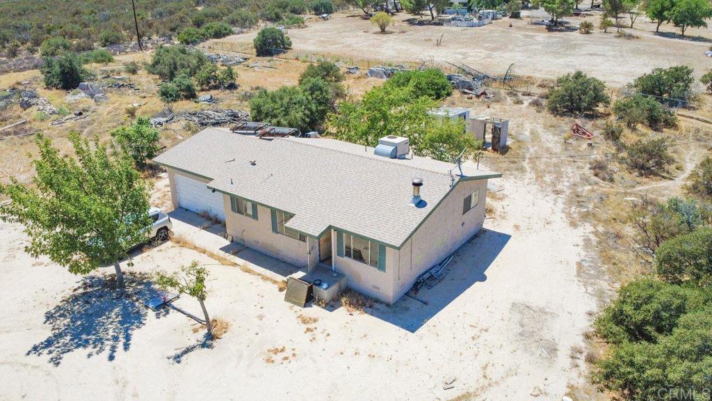 39635 Manzanita Dulce Road Boulevard, CA 91905 - Photo 2 of 33 a view of a house with a yard covered in snow