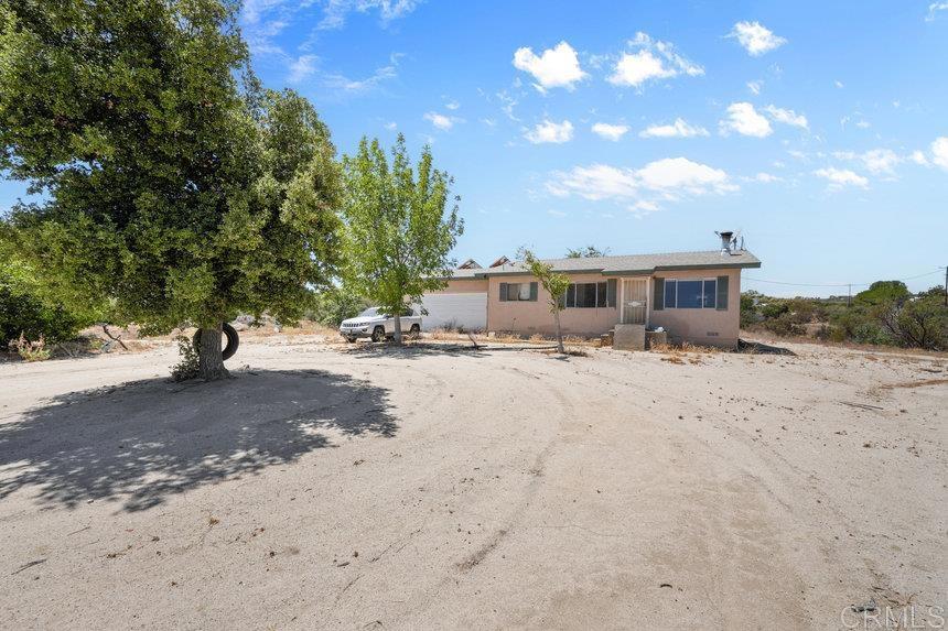 39635 Manzanita Dulce Road Boulevard, CA 91905 - Photo 33 of 33 a view of a house with a snow on the road
