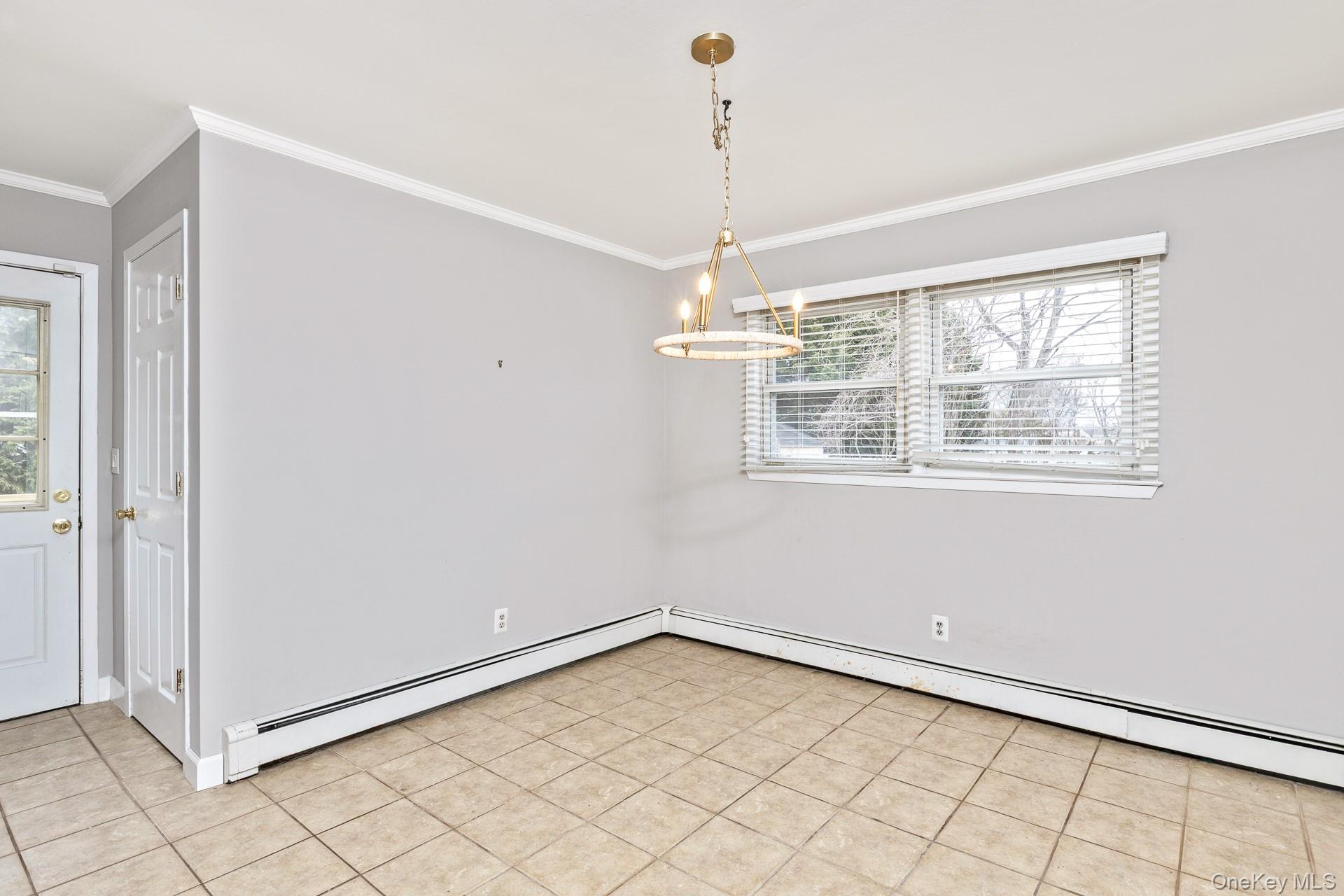 5 Richlee Street Blue Point, NY 11715 - Photo 12 of 27 a view of an empty room with a window