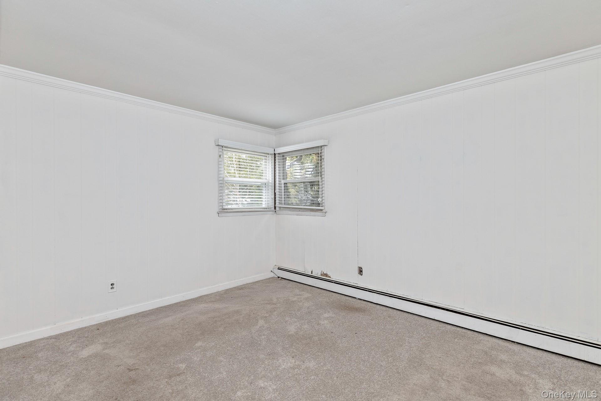 5 Richlee Street Blue Point, NY 11715 - Photo 17 of 27 an empty room with a window