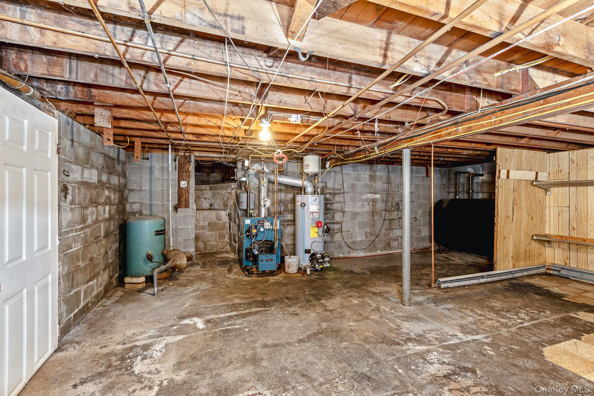 5 Richlee Street Blue Point, NY 11715 - Photo 20 of 27 a view of a room with wooden walls