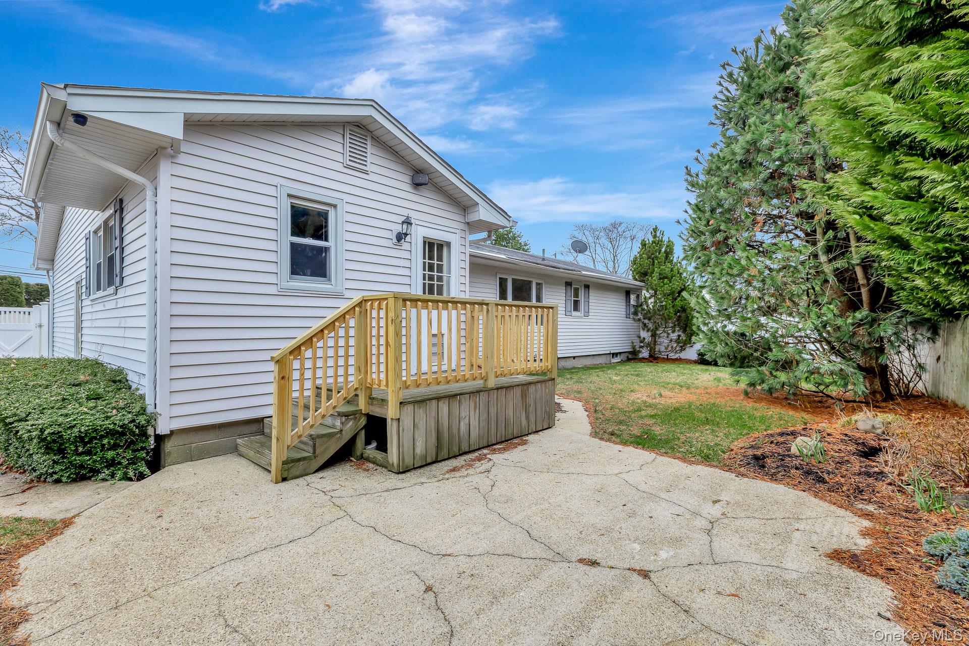 5 Richlee Street Blue Point, NY 11715 - Photo 26 of 27 a view of a house with a yard