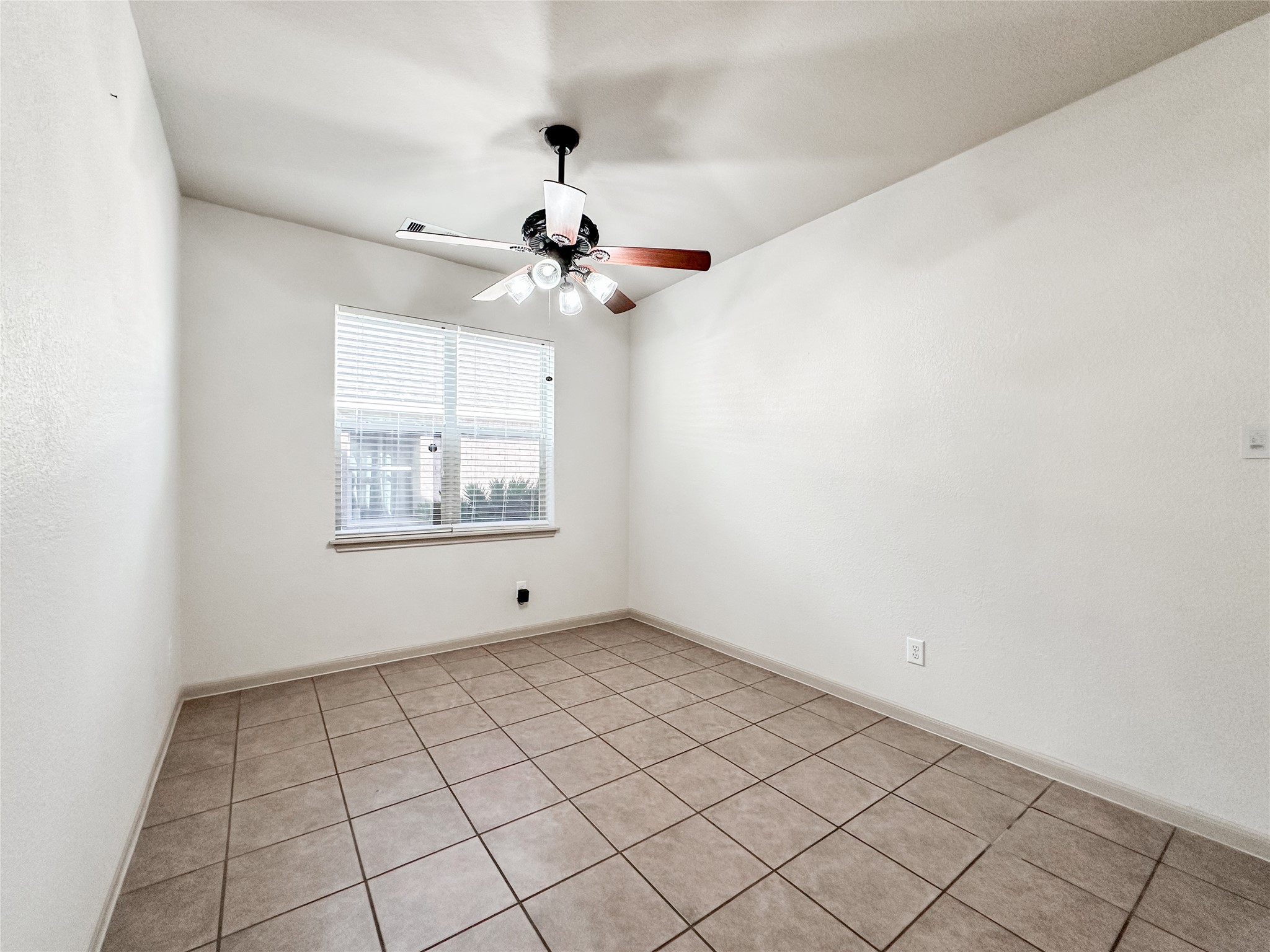 20319 Little Wing Drive Spring, TX 77388 - Photo 12 of 49 a view of an empty room with a window