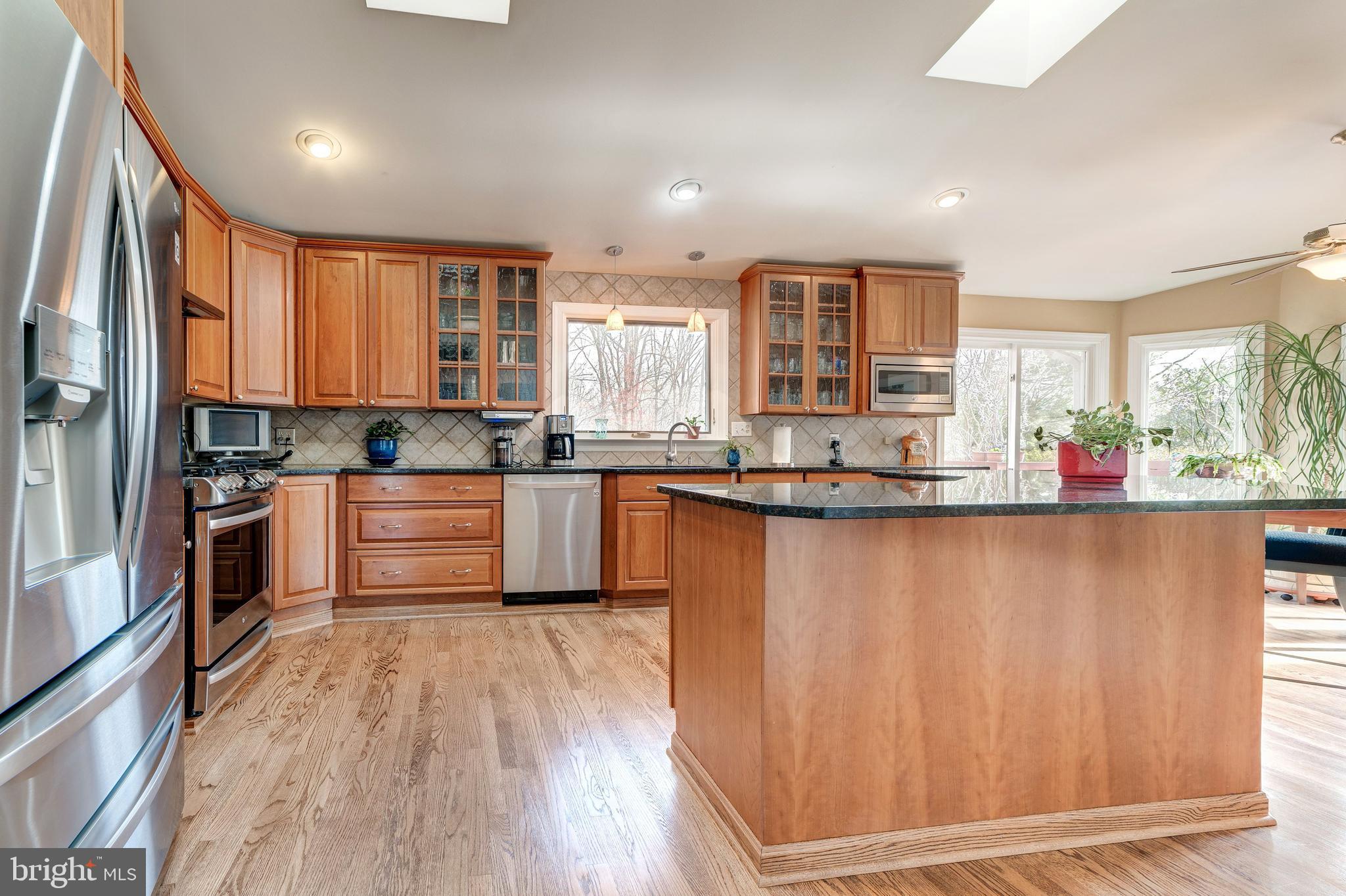 11108 Farm Road Great Falls, VA 22066 - Photo 13 of 58 Cherry cabinets, stainless steel appliances