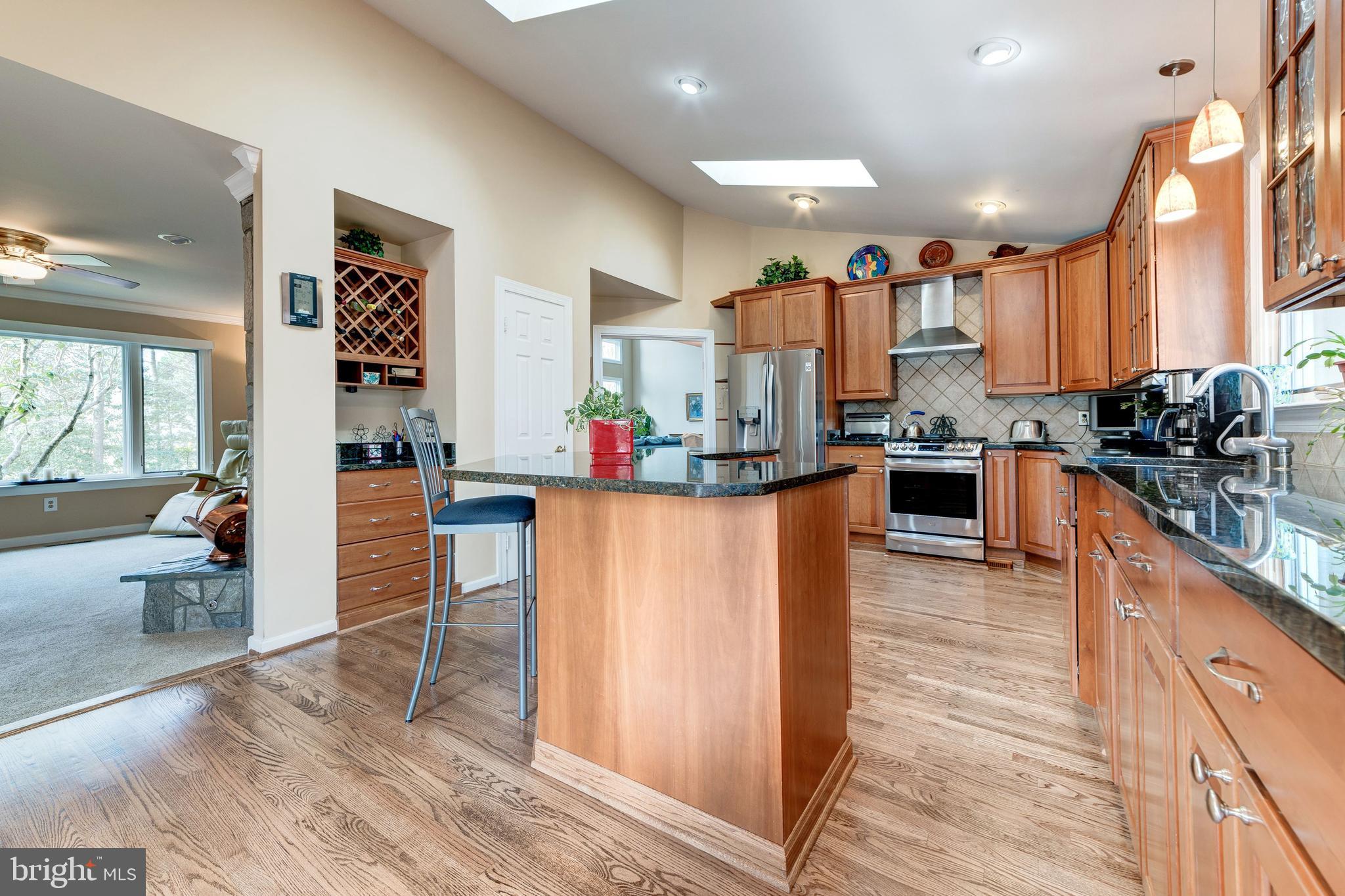 11108 Farm Road Great Falls, VA 22066 - Photo 17 of 58 kitchen opens to family room