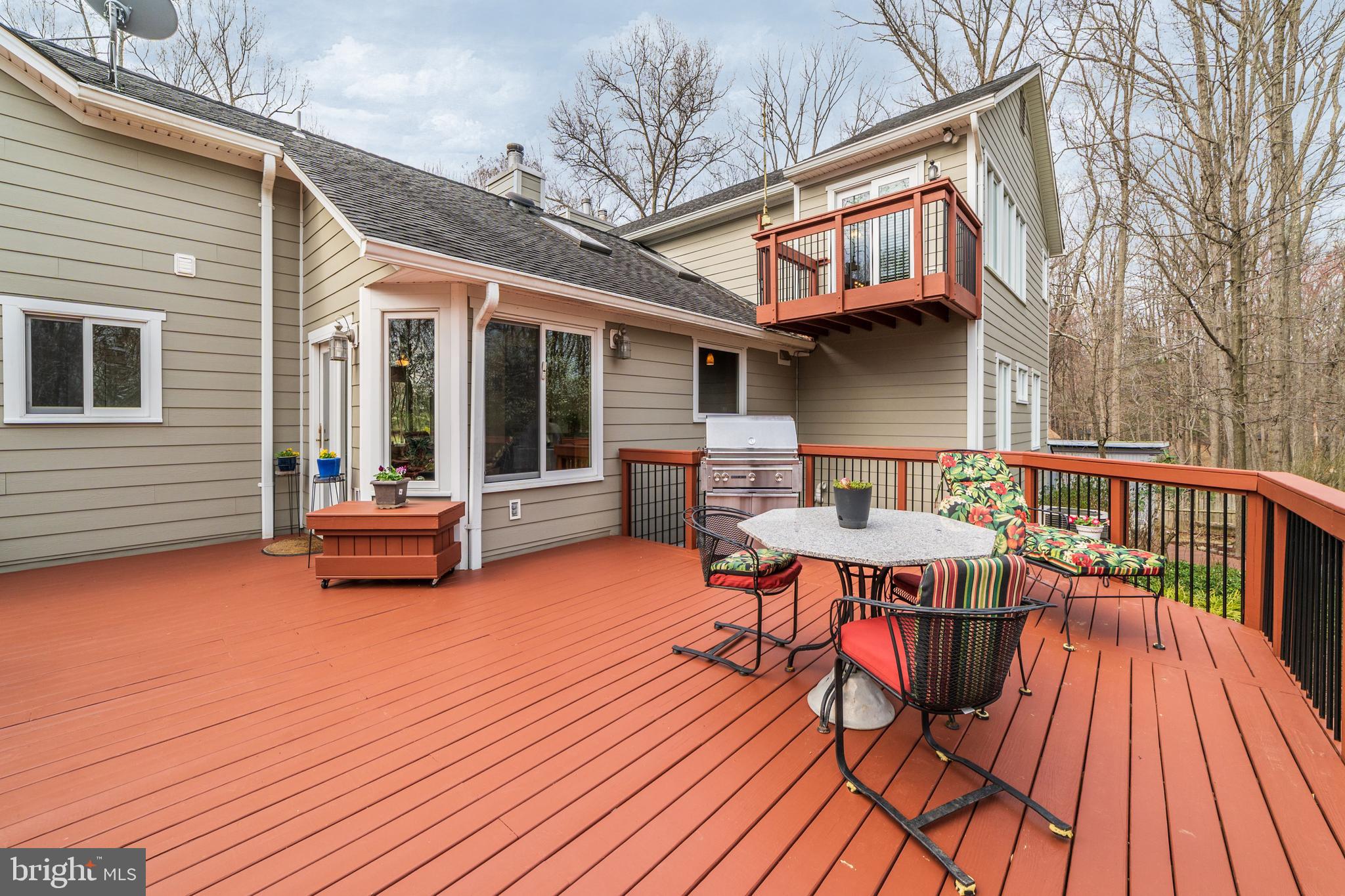 11108 Farm Road Great Falls, VA 22066 - Photo 21 of 58 kitchen deck toward private upper deck