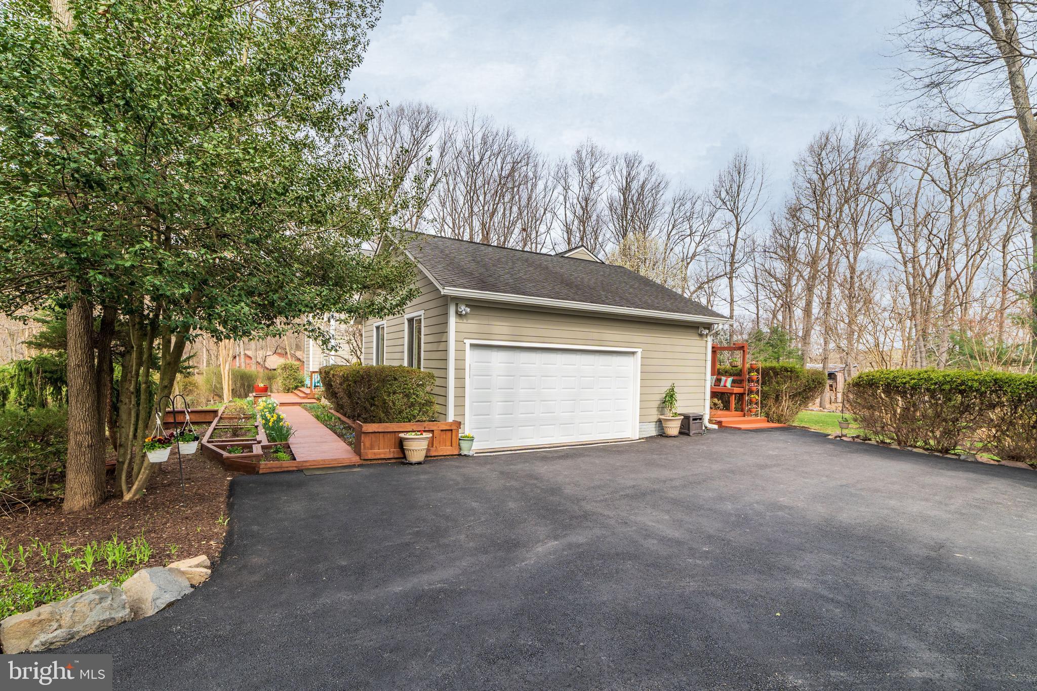 11108 Farm Road Great Falls, VA 22066 - Photo 49 of 58 2 car side-load garage with workshop "L"