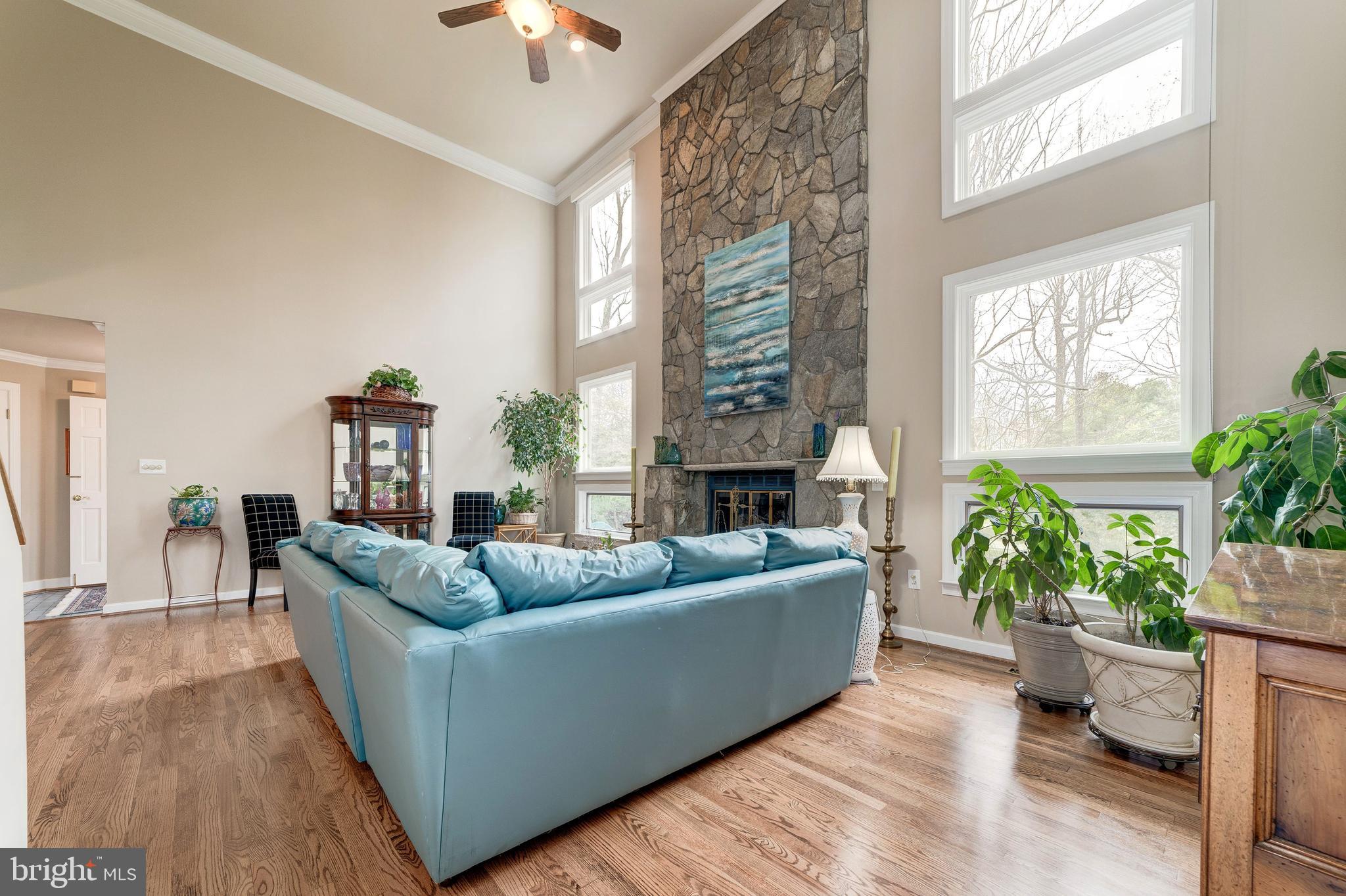11108 Farm Road Great Falls, VA 22066 - Photo 7 of 58 Floor-to-ceiling stone fireplace w gas logs