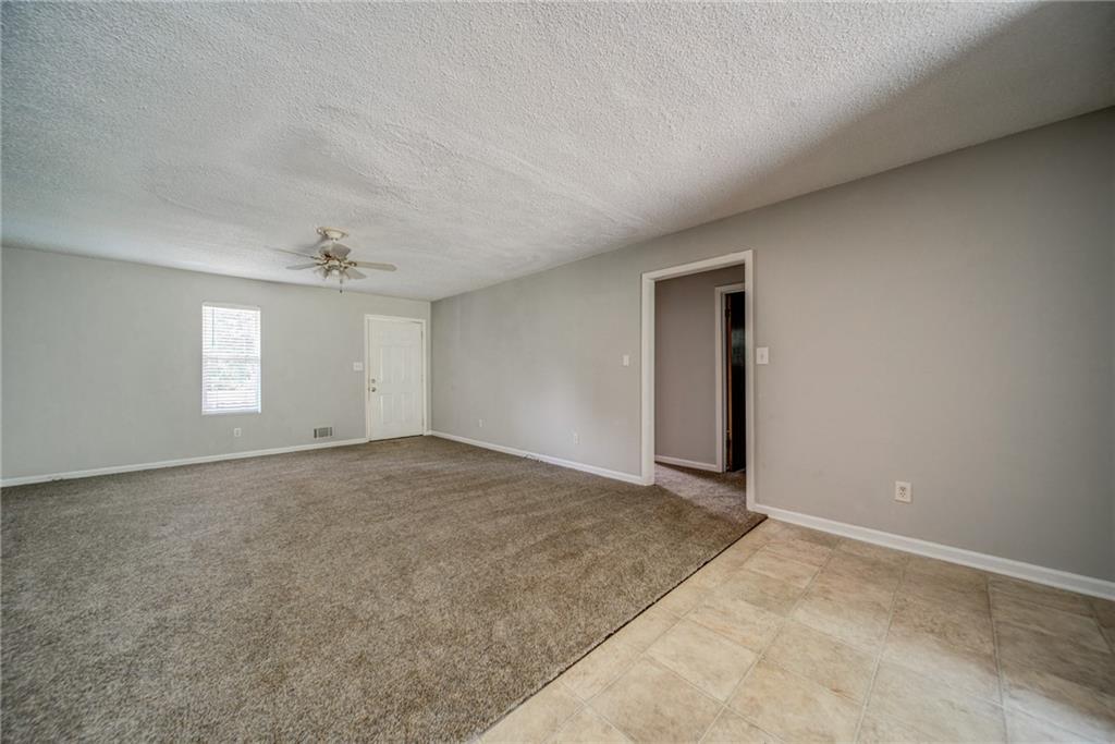 4355 East Paulding Drive, Unit A Dallas, GA 30157 - Photo 11 of 29 an empty room with windows and closet