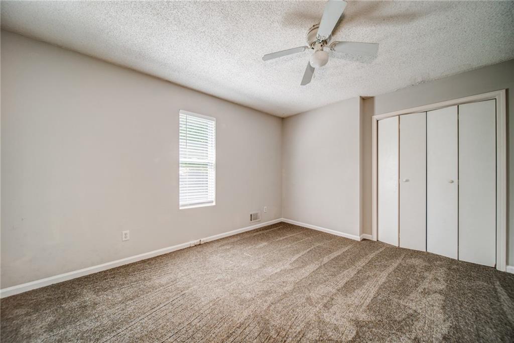 4355 East Paulding Drive, Unit A Dallas, GA 30157 - Photo 12 of 29 a view of an empty room with a window