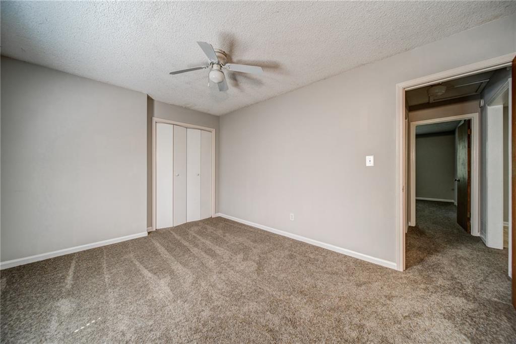 4355 East Paulding Drive, Unit A Dallas, GA 30157 - Photo 13 of 29 a view of an empty room with a fan