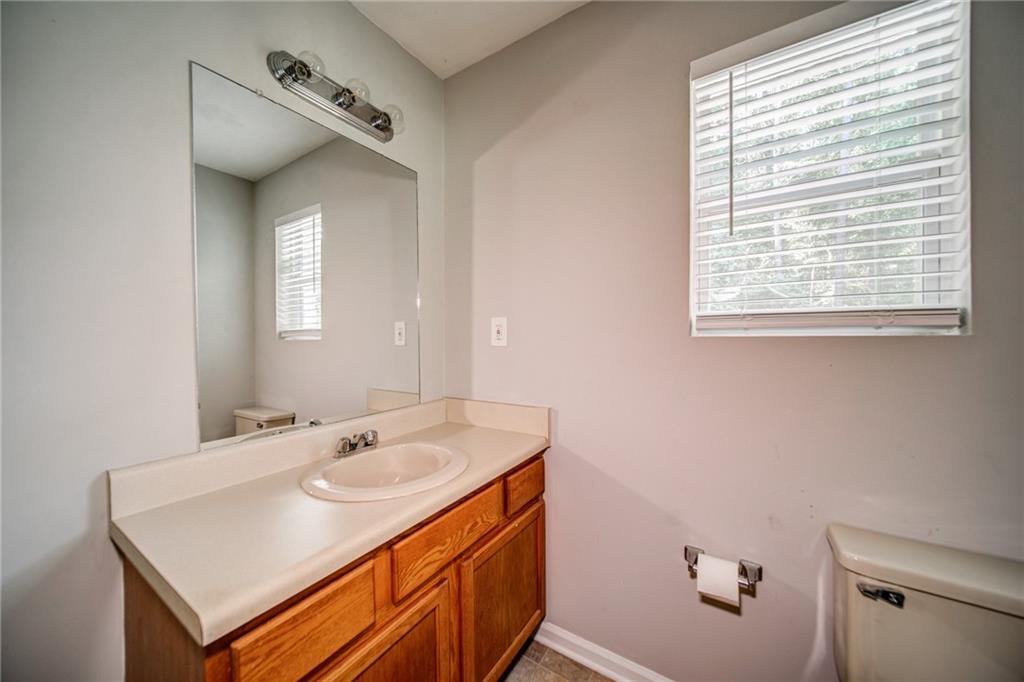 4355 East Paulding Drive, Unit A Dallas, GA 30157 - Photo 17 of 29 a bathroom with a sink and a mirror