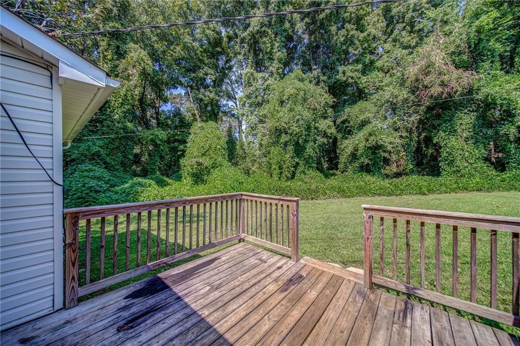 4355 East Paulding Drive, Unit A Dallas, GA 30157 - Photo 20 of 29 a view of balcony with wooden floor and fence