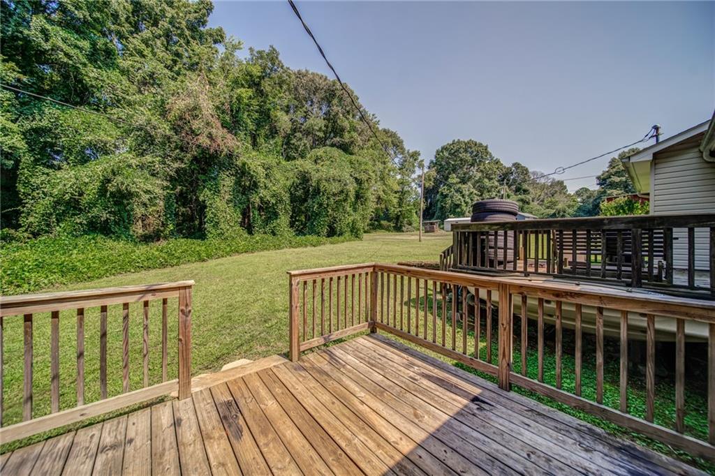 4355 East Paulding Drive, Unit A Dallas, GA 30157 - Photo 21 of 29 a view of balcony with wooden floor and fence